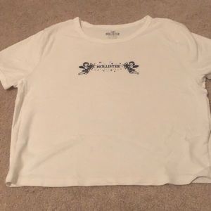 Crop white shirt with Angels embroidered on it